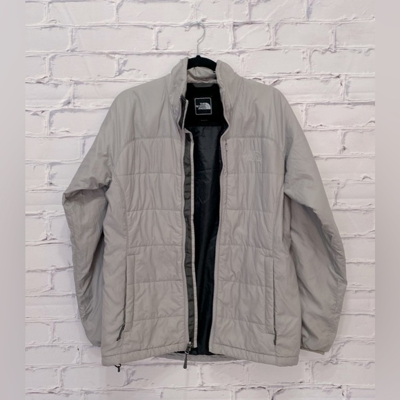 The North Face puffer jacket in a silver gray - Picture 1 of 5